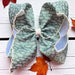 5" Green and cream moon stitch hair bow.